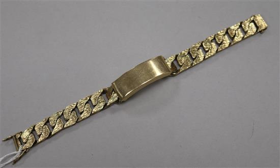 A heavy 1970s textured 9ct gold identity bracelet, 20.2cm.